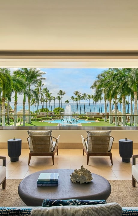 the lounge looking out onto the trees and ocean