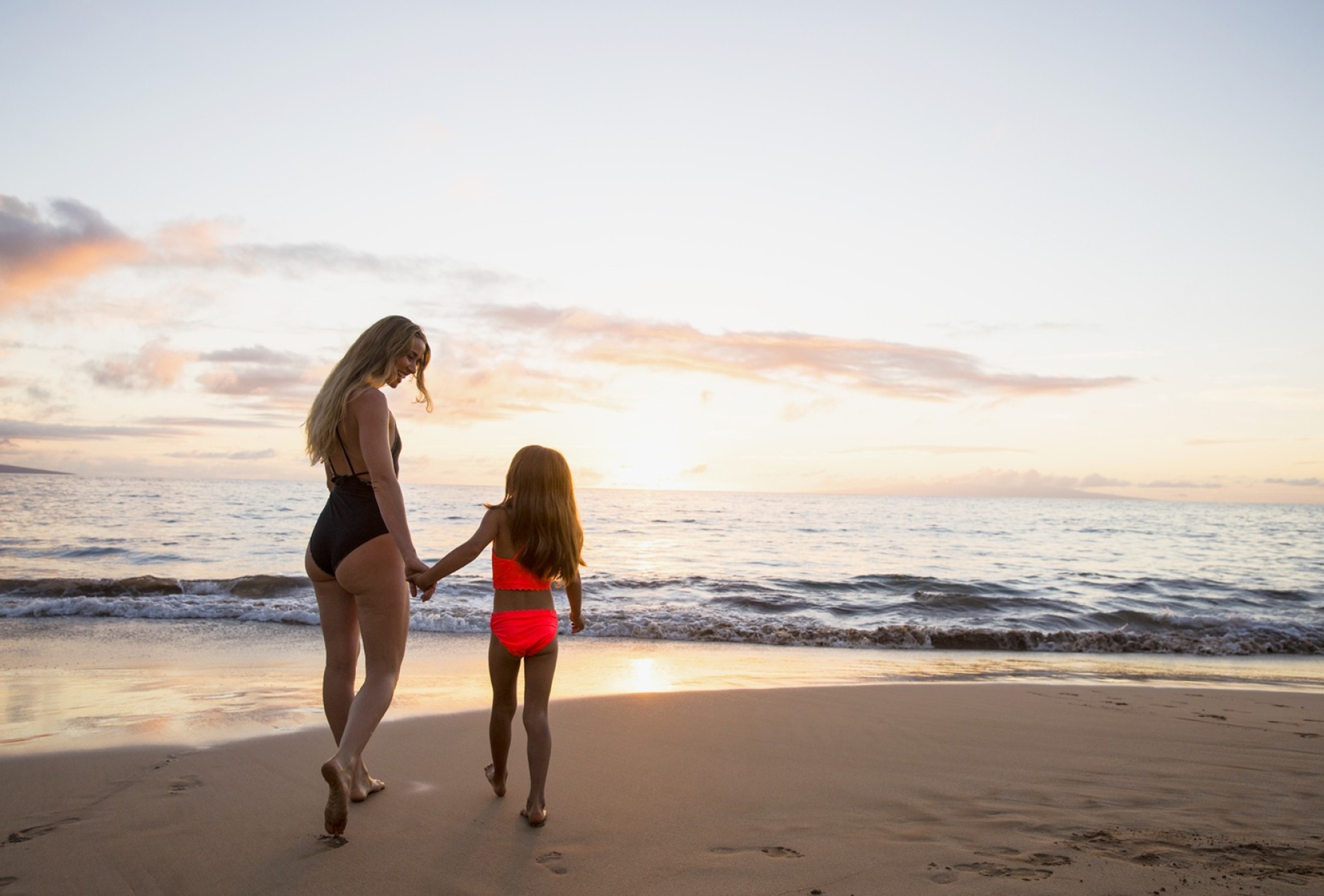 mom and daughter on beach
