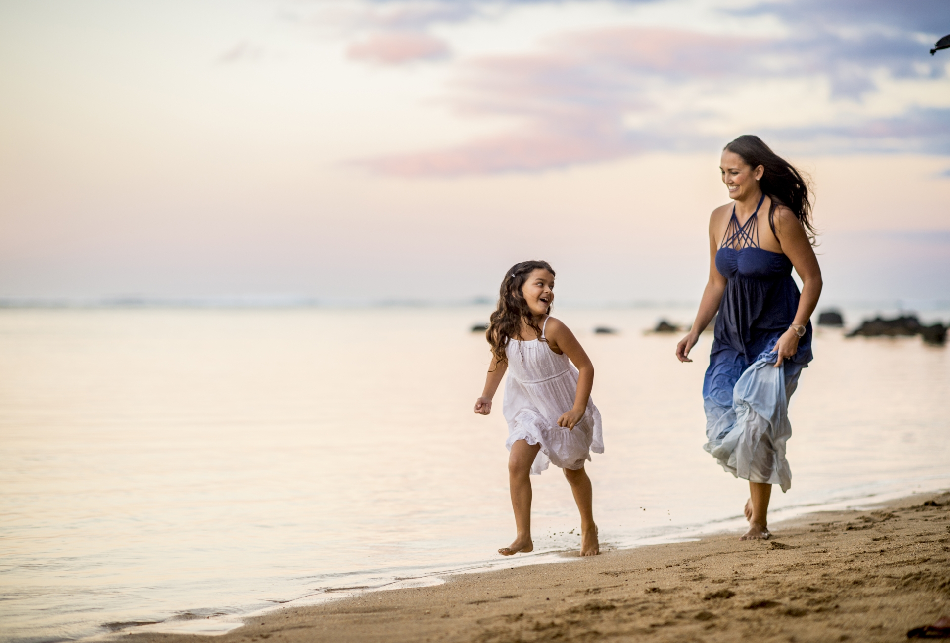 mom and daughter on beach